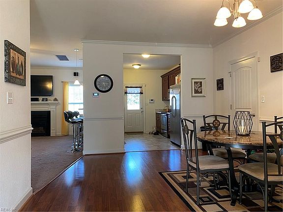 View of the open living space from the foyer. 