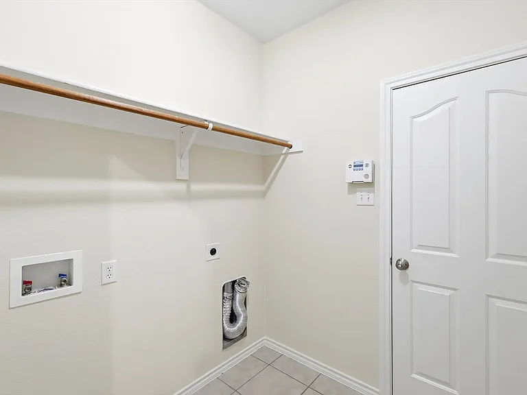 Large laundry that goes out to garage