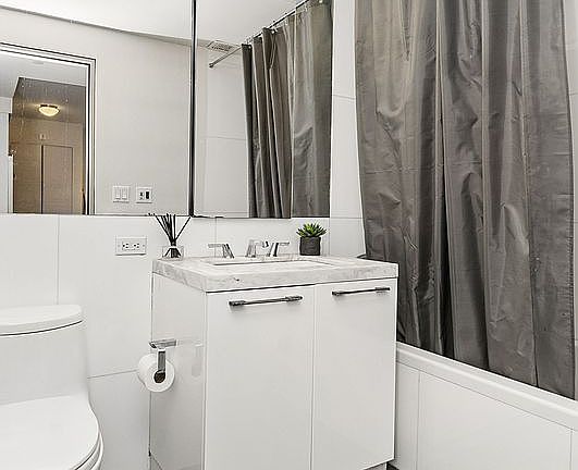 5th image of 311 E 11th St APT 3D