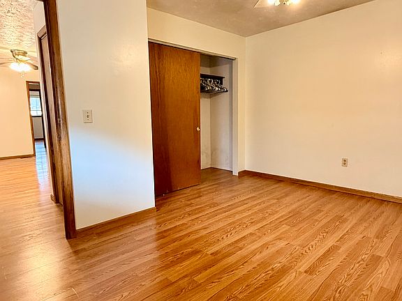 Double sliding door closet in large bedroom #1
