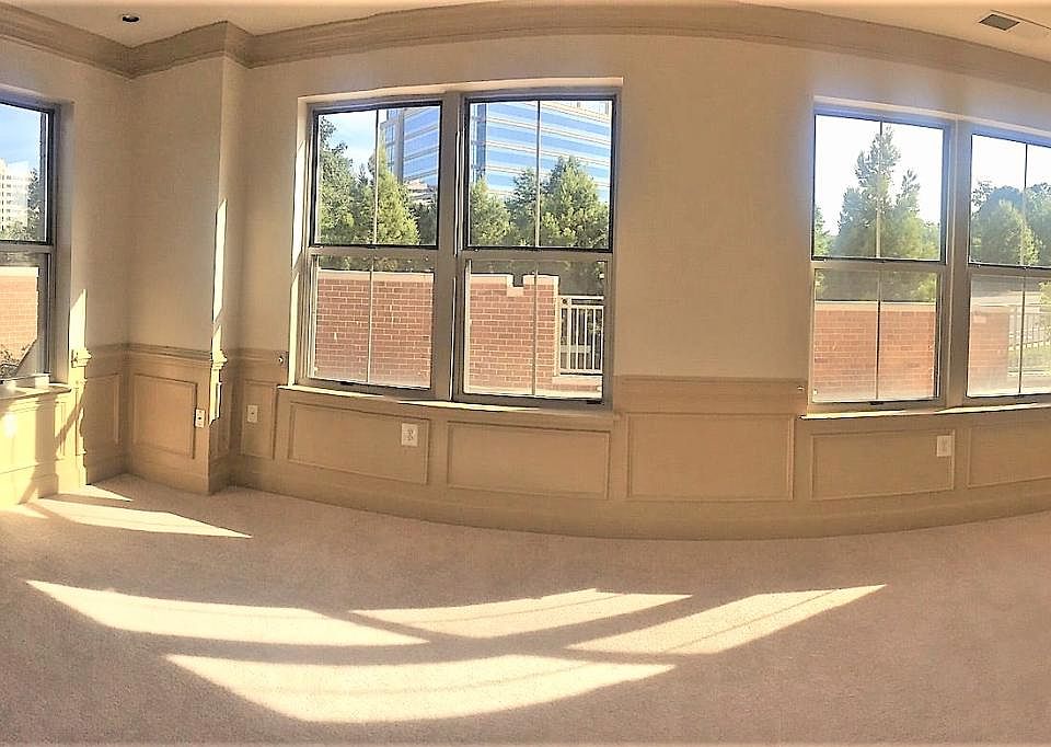 Corner unit living room, dinning room open concept with your own above ground private 1,100 sqft patio/ balcony.