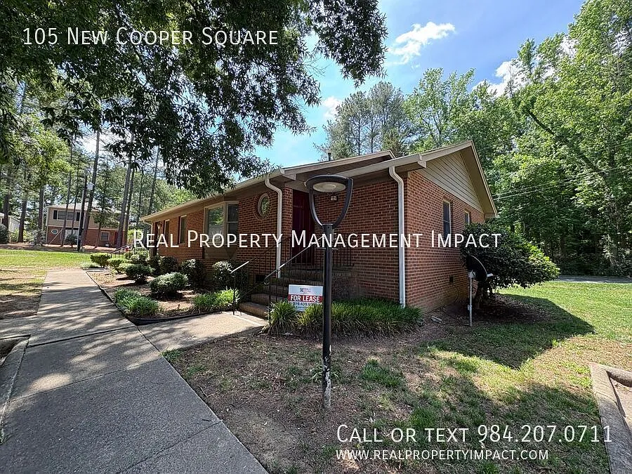 Move-In Special: Charming 2-Bedroom Brick Townhome | Pet-Friendly & Perfectly Located To Unc — Photo 3