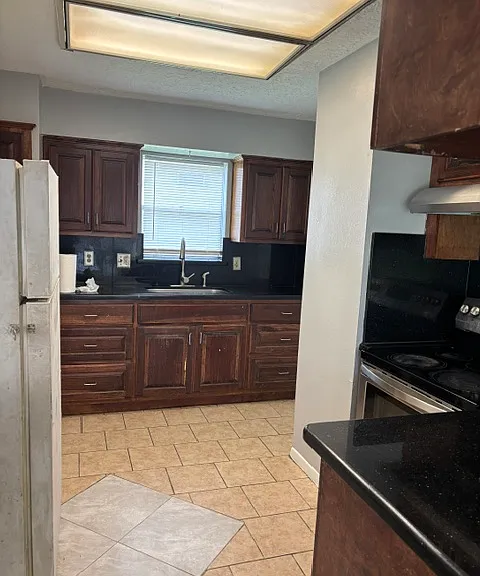 12702 Hunting Brook Dr — Photo 4