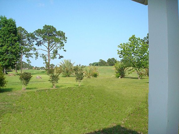 1/3 acre lot backing up to green