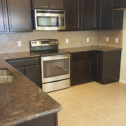 Kitchen with stainless steel appliances