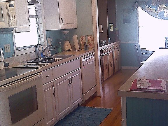 4th image of 447 NE Pinelake Village Blvd