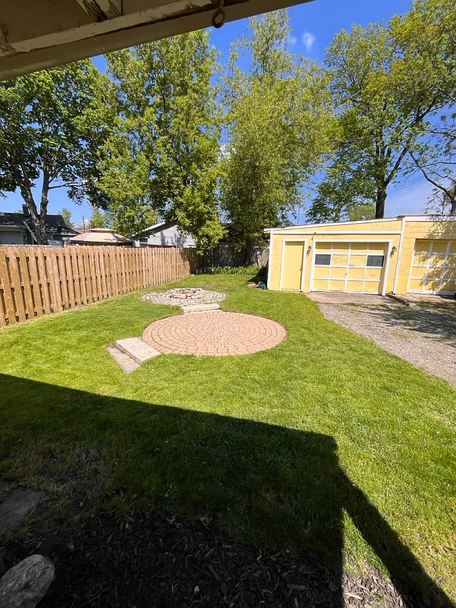Backyard view from the covered deck. - 33835 N Oak St