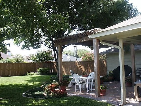 OUTSTANDING ABOR-COVERED PATIO