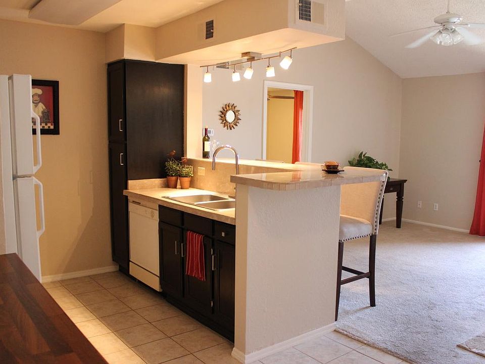 Kitchen opens to Living room