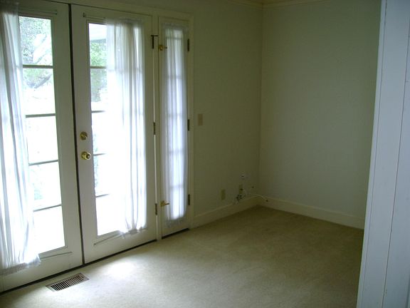 Downstairs bedroom or office with balcony