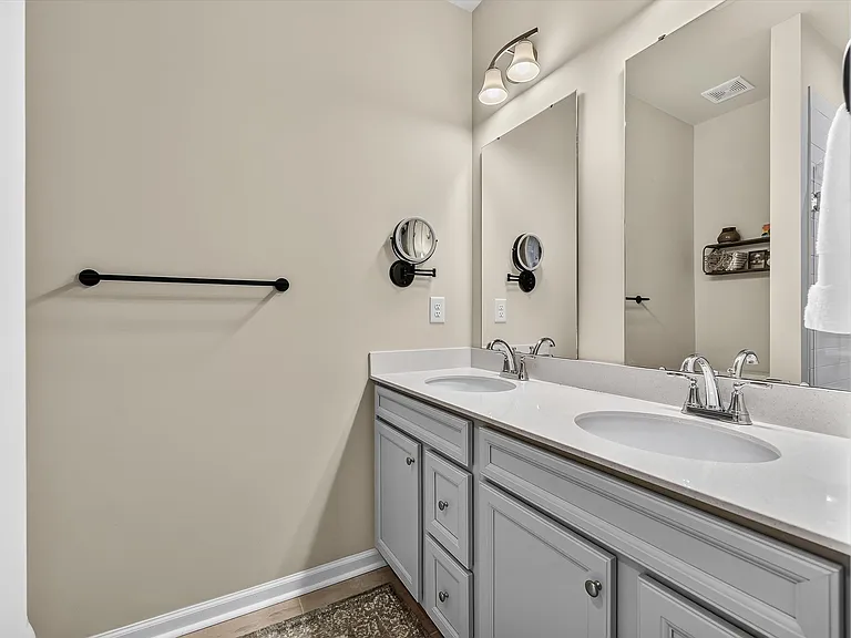Owner's Bathroom with a double vanity