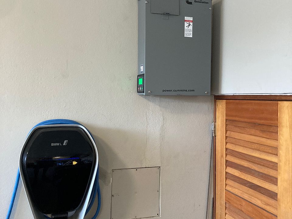 Electric car charger, Automatic Transfer switch and garage storage entrance
