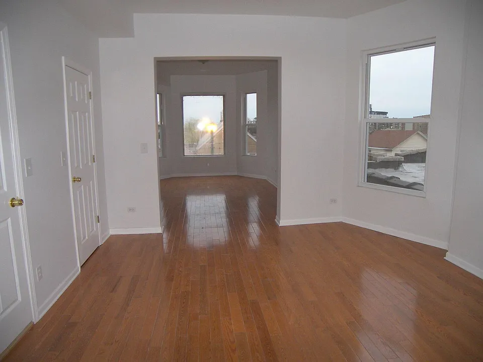 DINING ROOM LOOKING IN TO LIVING ROOM