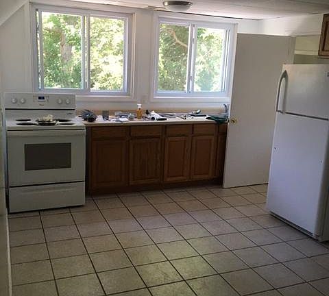 Nice sized and very bright kitchen with dining area.