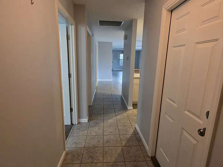 Entry hallway, door leads to the garage