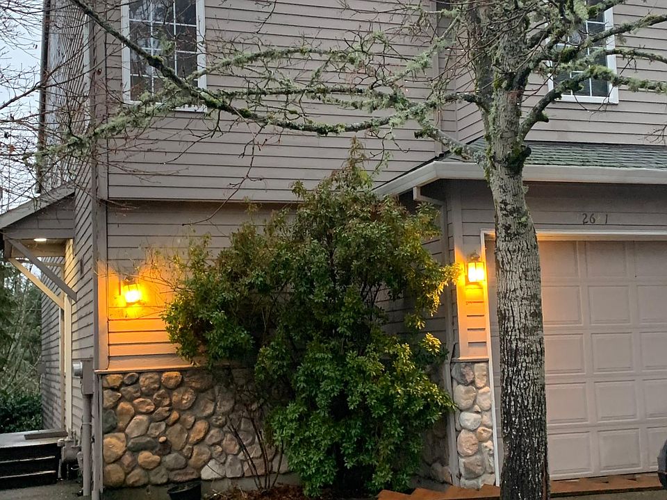 2 story home with a huge floored space for storage under the house. Backs up to open space and walking path.