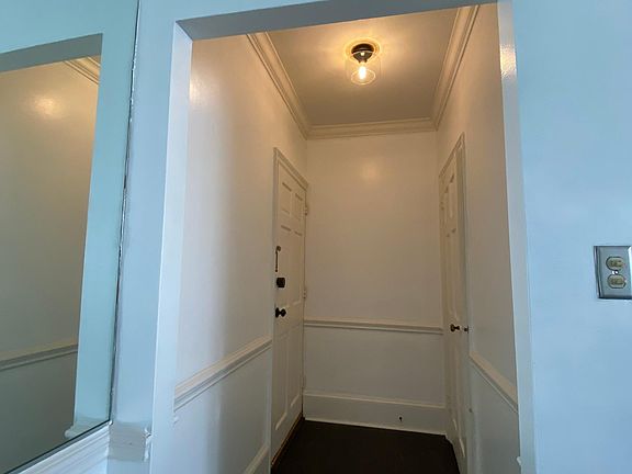 entrance hallway with new lighting and paint