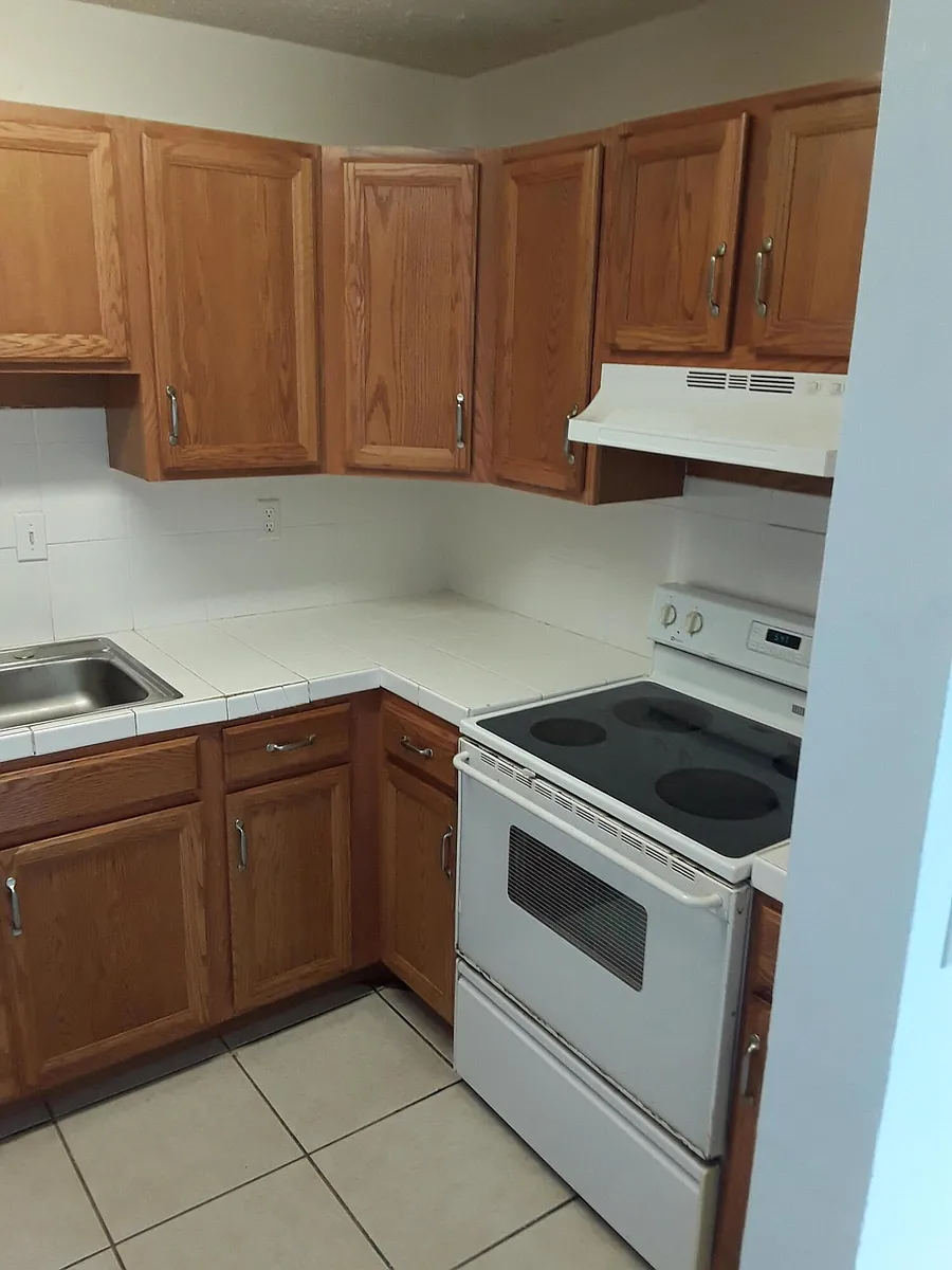 Building Photo - 7662 Kimberly Blvd #1-3
