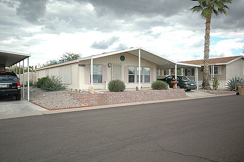 Deluxe Ground-Set Home with Impressive Layout in Gated 55+ Park (Pets Welcome)