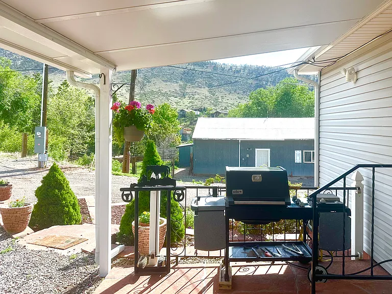 Outdoor grill with piped in natural gas
