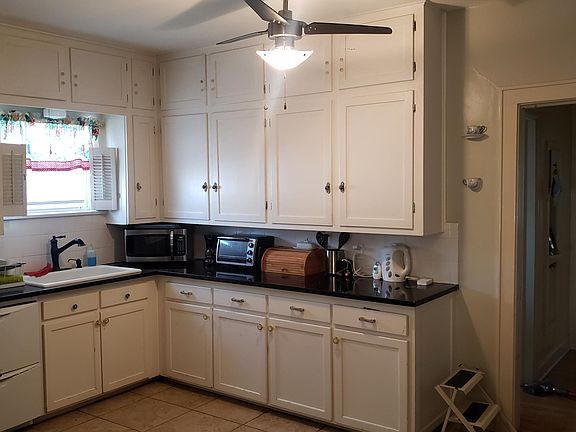 Kitchen with window looking towards back yard