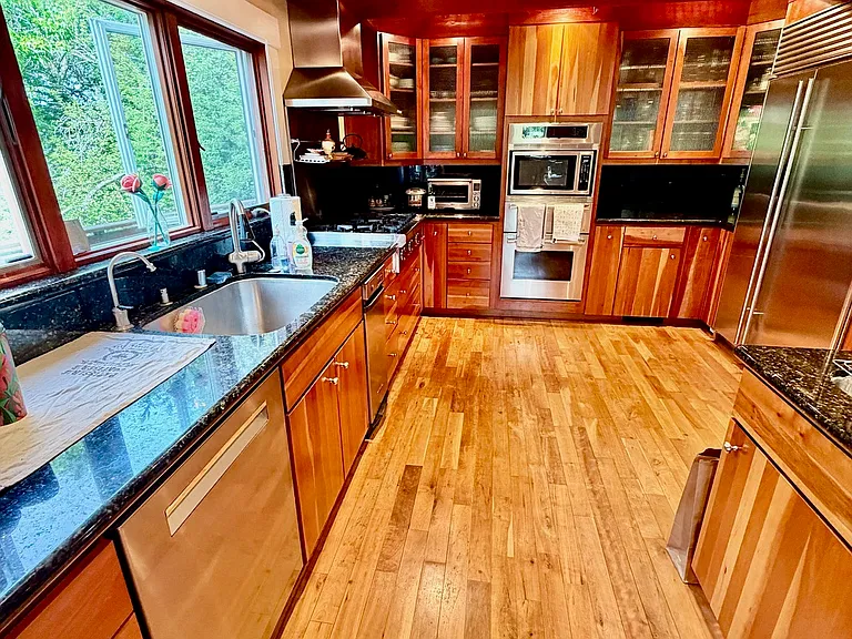 Part view of large kitchen, taken from the living room.