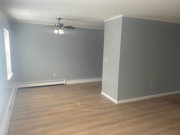 Another view of dining area off kitchen and part of living room