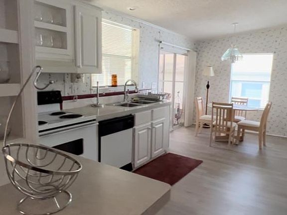 Kitchen counter, electric stove, comes with cutlery, crockery and utensils