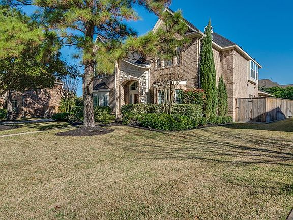 Mature Cypress trees and landscaping compliment the property and create your perfect outdoor living space.