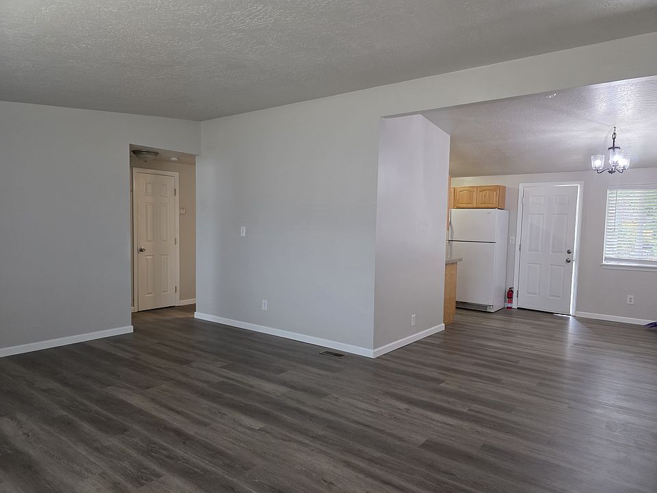 From corner of Livingroom showing diningroom on right and hall on left