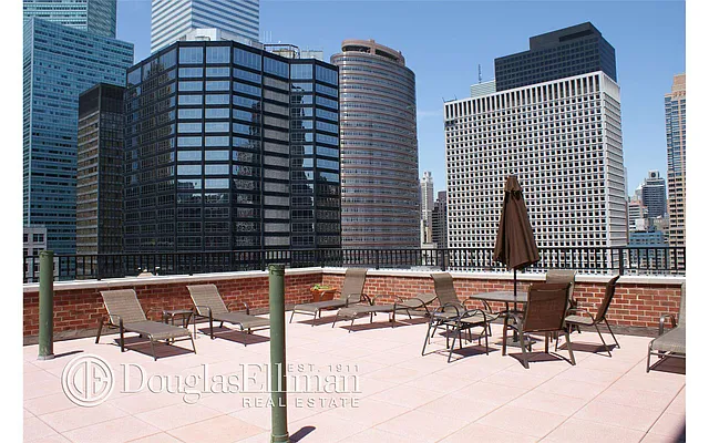 Sold by Douglas Elliman | media 18