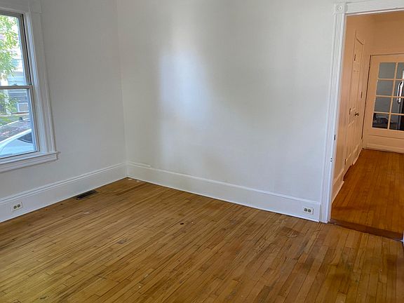 bedroom 1 has bay window and side window facing south and west