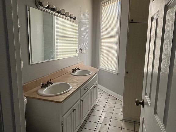 Half Bath; double vanity no shower