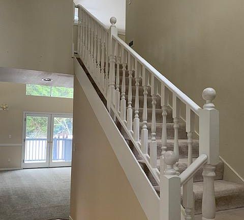 Stairway to 2nd floor near front entrance
