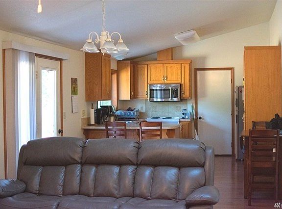 Open concept living with family room right off of kitchen and dining area.