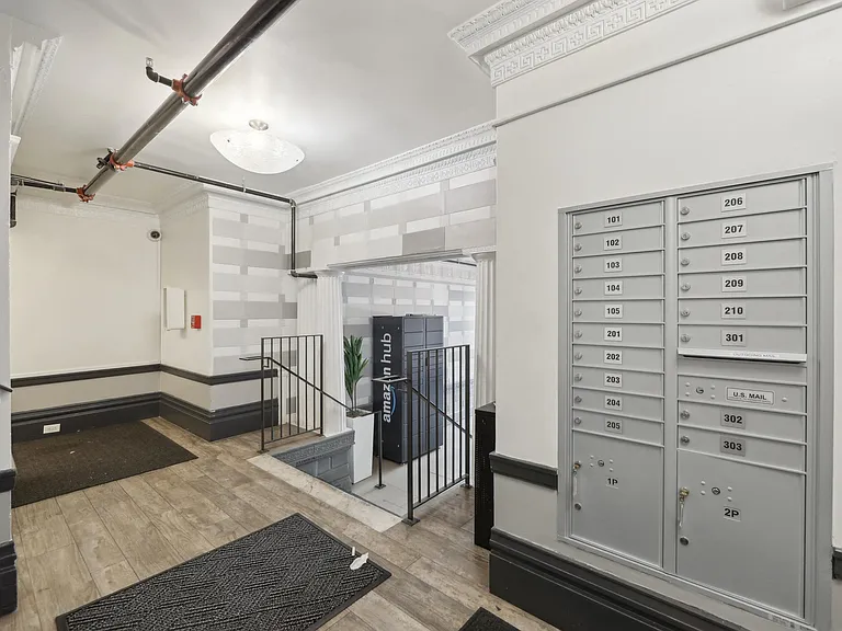 Apartment foyer with a mail receiving area