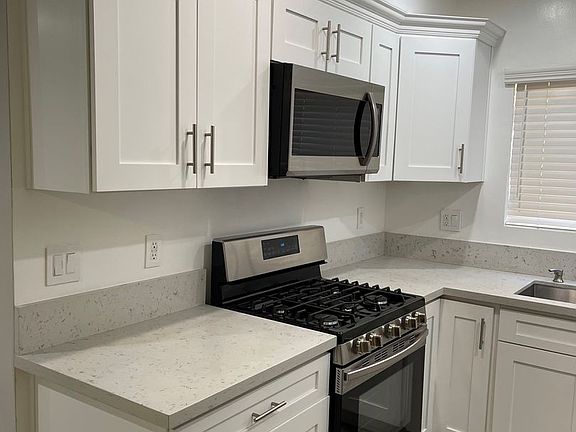 4th image of 10219 Woodworth Ave Unit 1