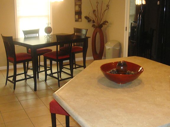 Kitchen with Island, includes Refrigerator, Dishwasher, & Ne