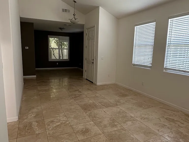 Living Room, front door entrance, looking into family room