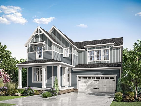 brick, siding and board and batten house with front porch