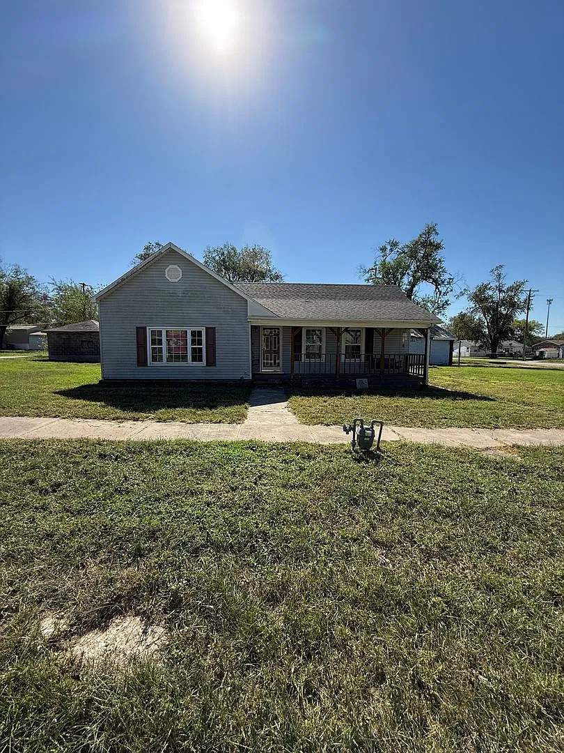 Charming 3 Bedroom Home with Detached Garage on Spacious Lot — Photo 1