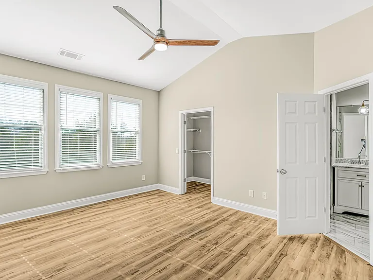 Spacious main room with high ceiling