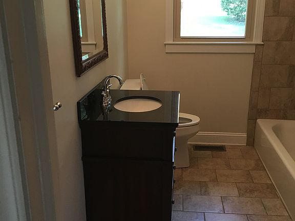 New vanity and tile floor