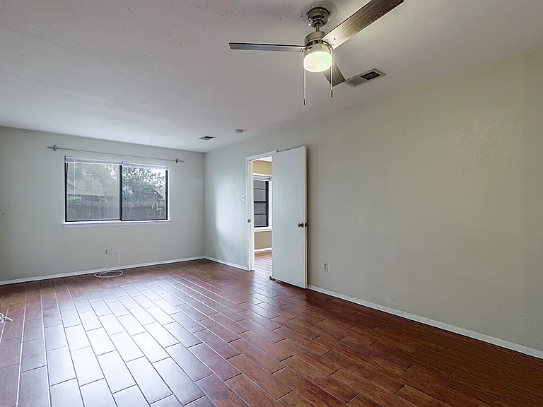 Master bedroom is large. Will accommodate a king size bed, and small office area.
