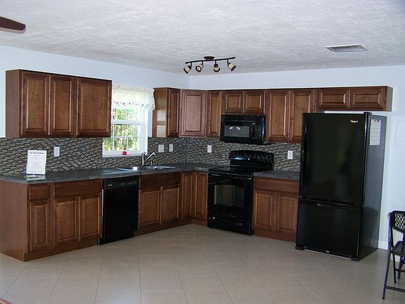 Kitchen's open to main entry