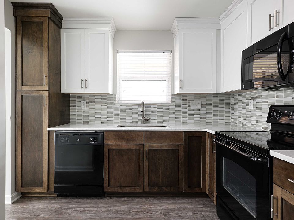 Modern kitchen with custom cabinetry and quartz countertops