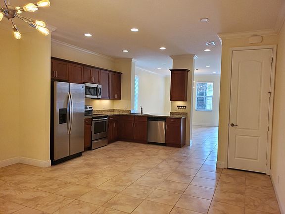4th image of 8352 Cocoplum Sound Ln