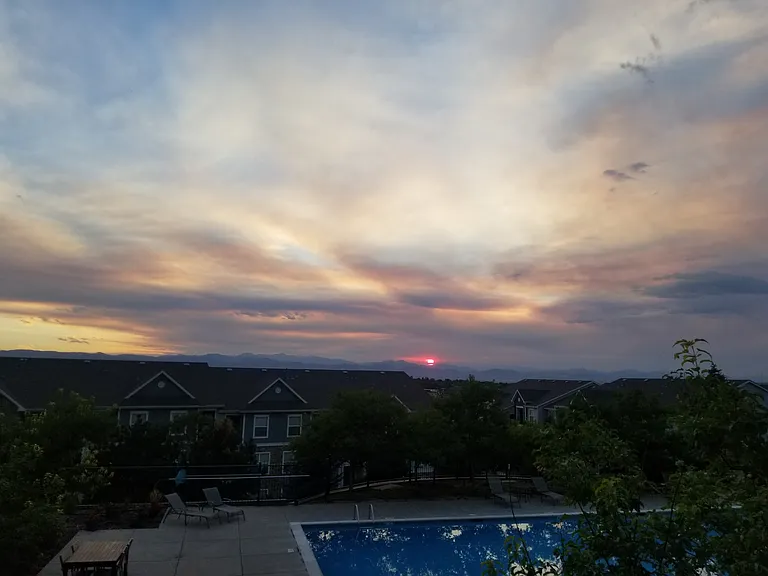 Year-Round Sunset views from the unit's balcony which overlooks the pool