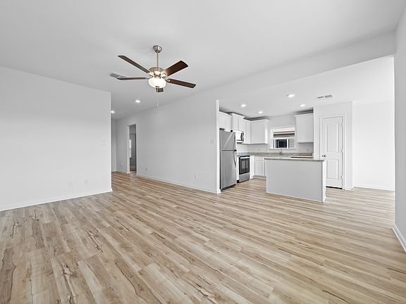 A foyer leads guests into the family room