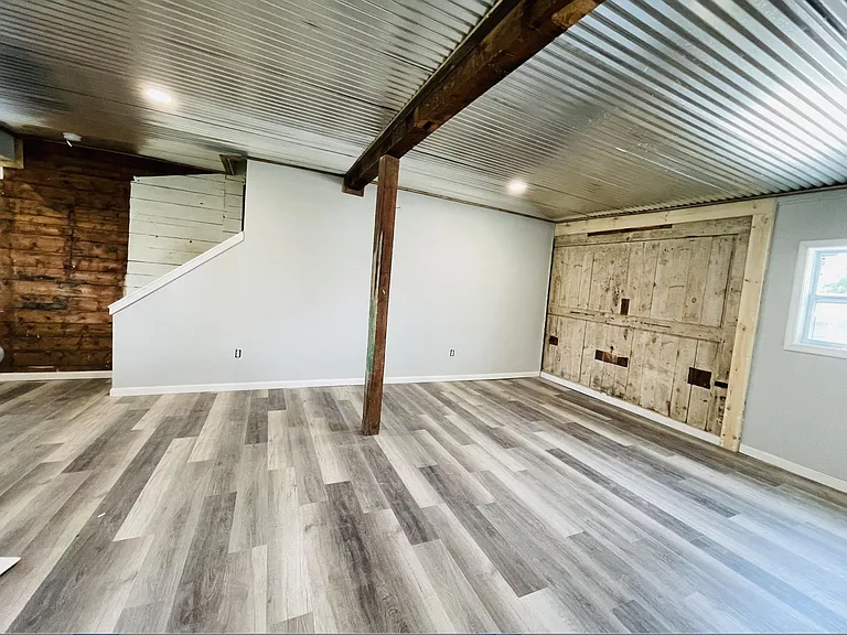 Old barn door ( found behind wall ) living room